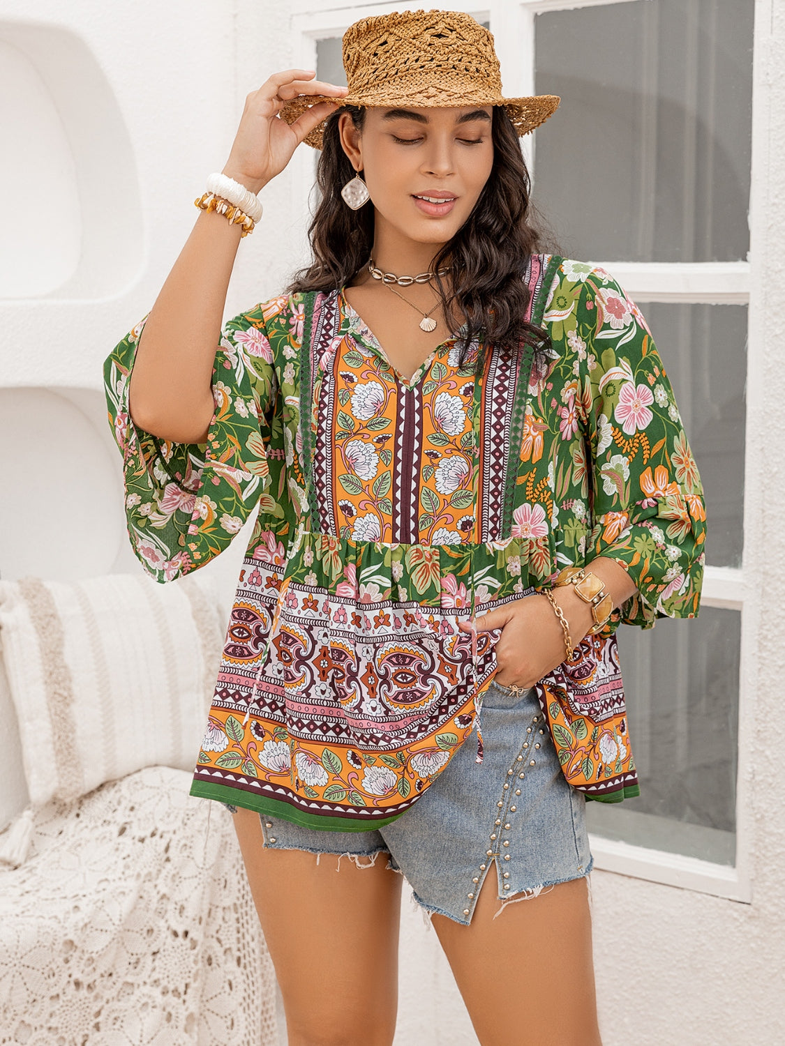 Printed Tie Neck Peplum Blouse